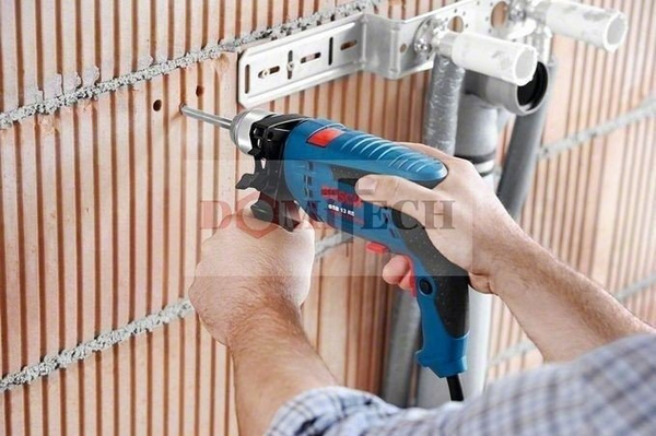 Bosch GSB 13 RE Wiertarka udarowa + walizka + wiertła 0601217103