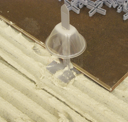 Pasek dociskowy do poziomowania (100 szt.) Rubi